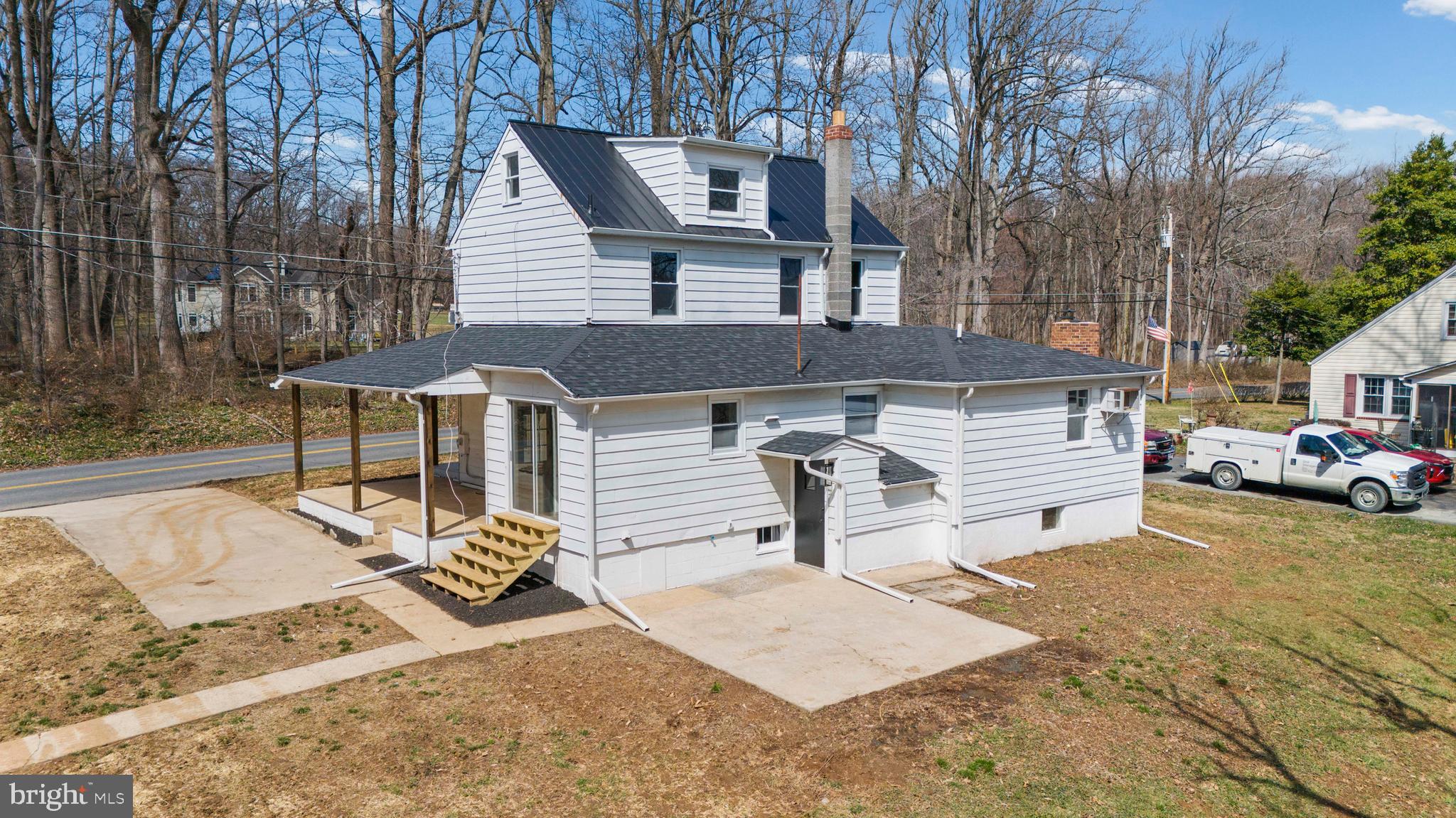 541 Robinhood Road Havre de Grace, MD 21078 - Photo 36 of 49 a table and chairs in front of house