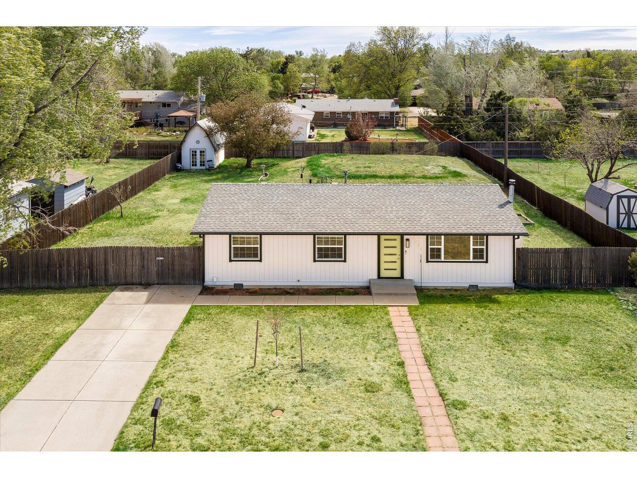 9234 Arapahoe Road Boulder, CO 80303 - Photo 6 of 37 fully fenced .33 acre lot, offering privacy and room to garden, play or entertain