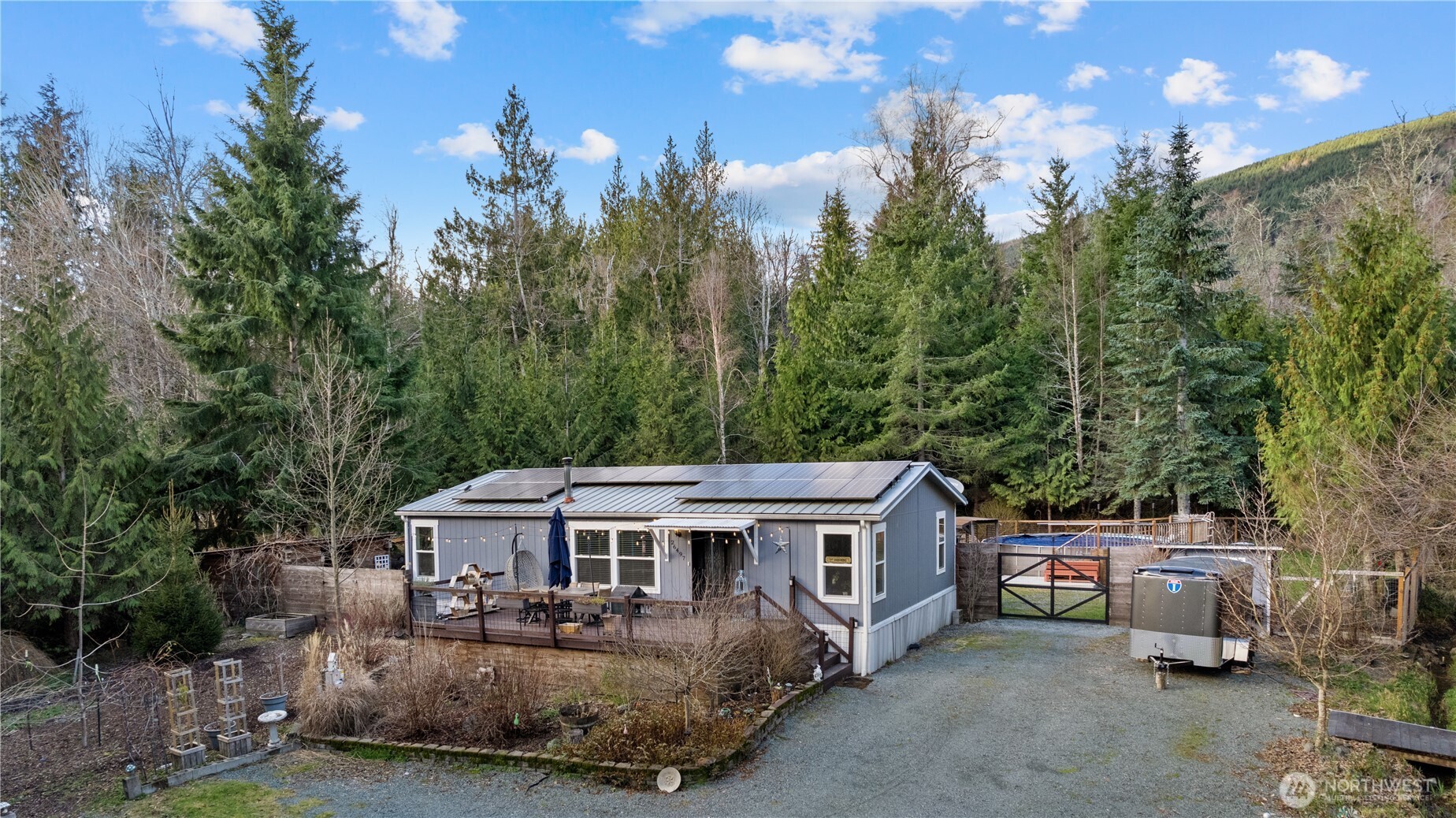 26497 Helmick Road Sedro-Woolley, WA 98284 - Photo 30 of 30 a view of a house with a outdoor space