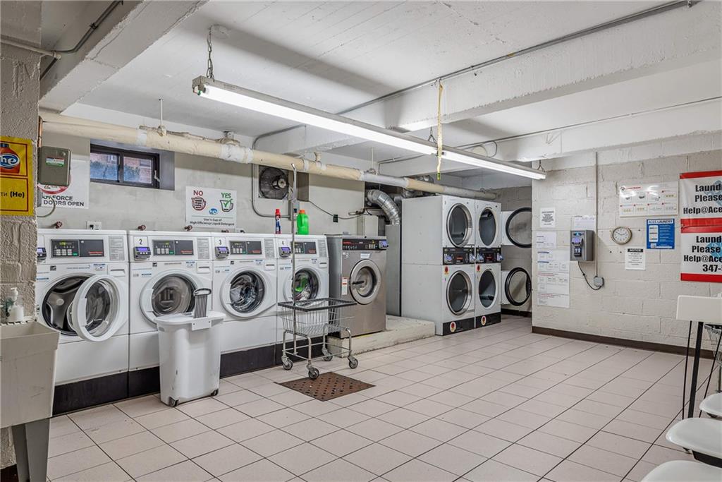 2425 Haring Street, Unit 2K Brooklyn, NY 11235 - Photo 8 of 12 a utility room with dryer washer and other items