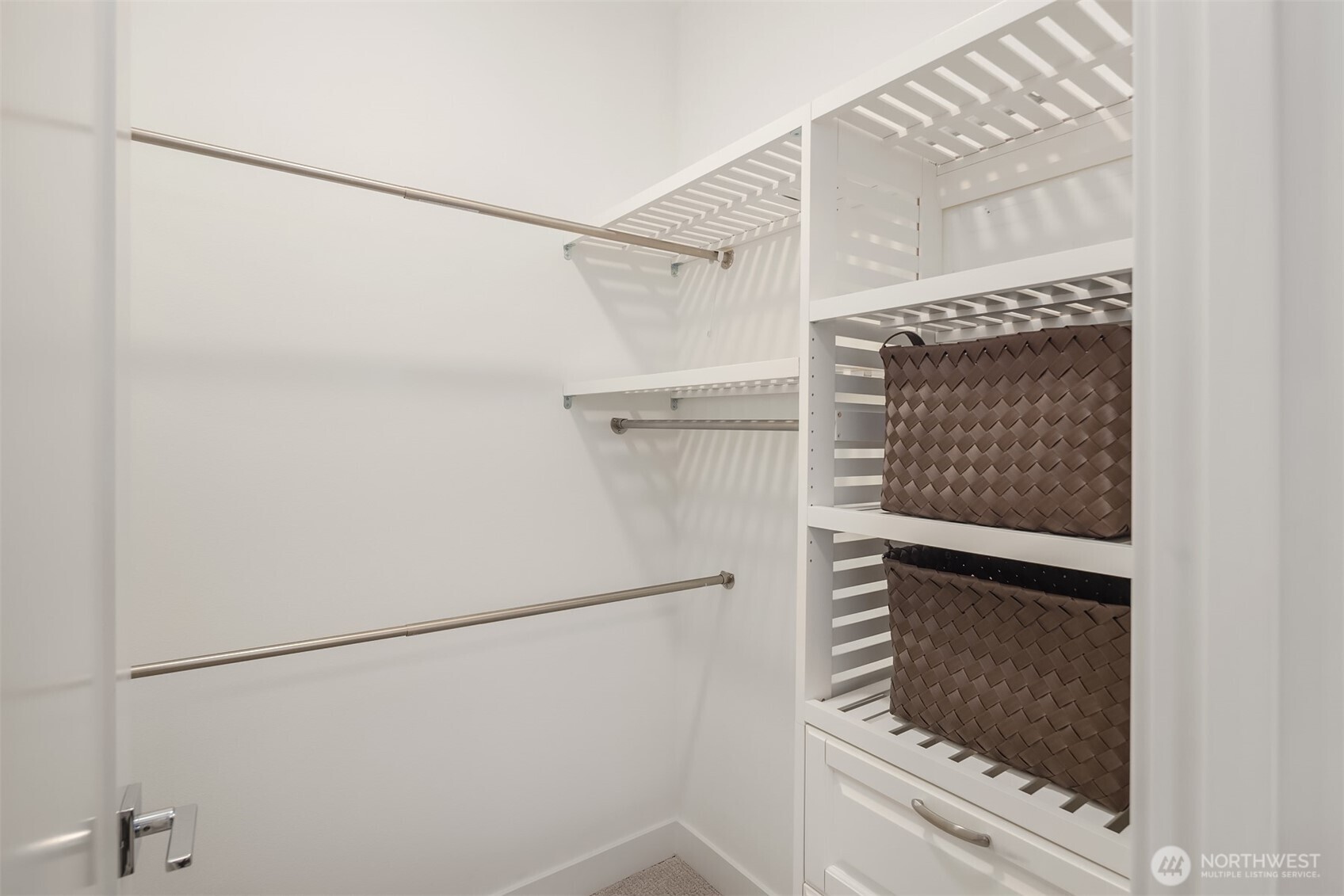 1827 14th Avenue, Unit B Seattle, WA 98122 - Photo 14 of 27 a view of walk in closet with clothes
