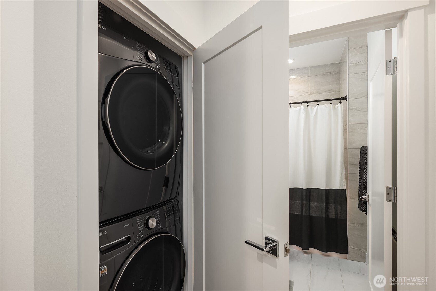 1827 14th Avenue, Unit B Seattle, WA 98122 - Photo 16 of 27 a close view of a utility room with dryer and washer