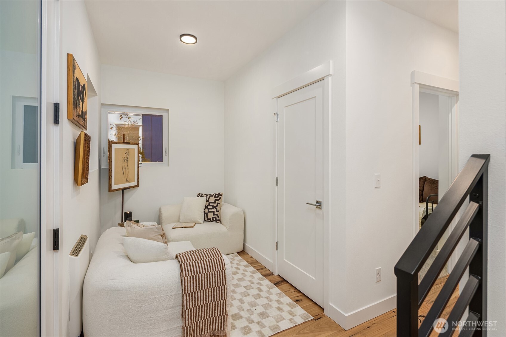 1827 14th Avenue, Unit B Seattle, WA 98122 - Photo 2 of 27 a bedroom with a bed and a window