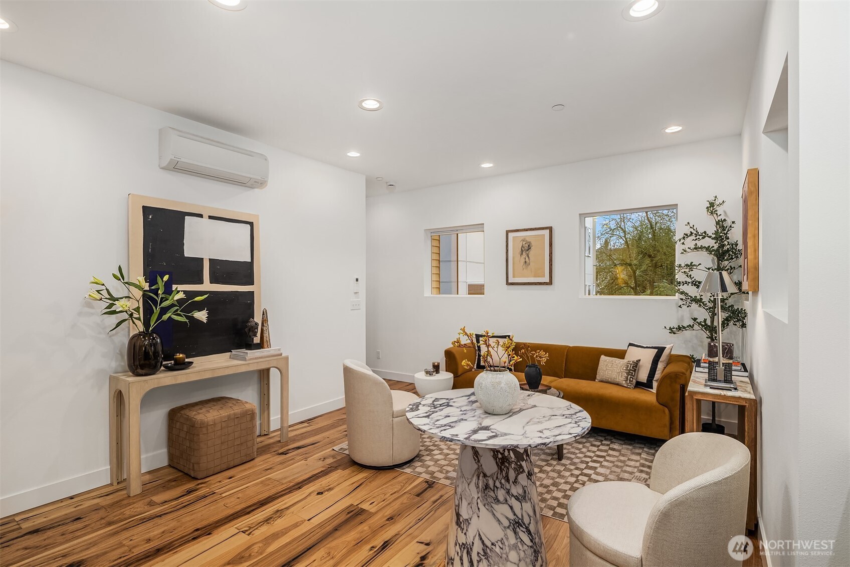 1827 14th Avenue, Unit B Seattle, WA 98122 - Photo 7 of 27 a living room with furniture and wooden floor