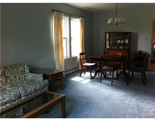4120 Ewalt Road Gibsonia, PA 15044 - Photo 2 of 10 Dining Room. Freshly painted DR/ LR combination with new carpeting throughout home. HW under bedrooms and DR areas.
