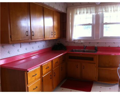 4120 Ewalt Road Gibsonia, PA 15044 - Photo 3 of 10 Kitchen. Bright windows show quality cabinets in kitchen.