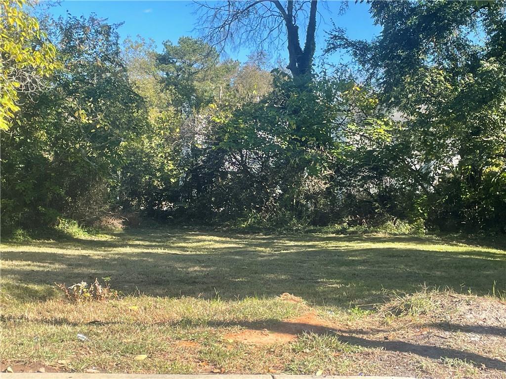 948 Coleman Street Southwest Atlanta, GA 30310 - Photo 2 of 4 a view of a water with an outdoor space and seating