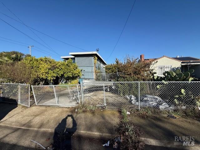 700 Springs Road Vallejo, CA 94590 - Photo 1 of 1 a view of a patio with table and chairs and potted plants