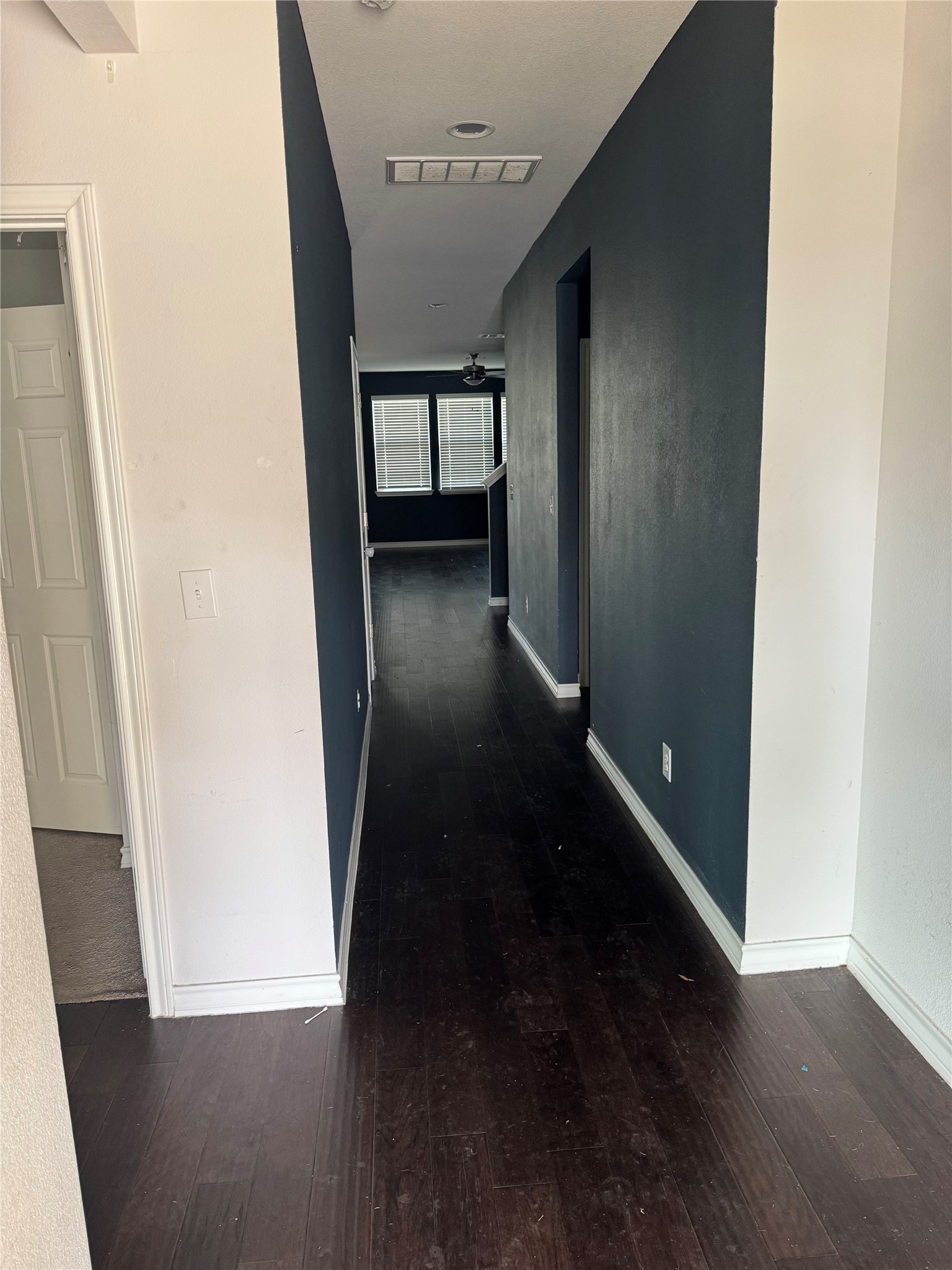 333 Capstone Road Liberty Hill, TX 78642 - Photo 4 of 40 Hall with dark wood-style floors