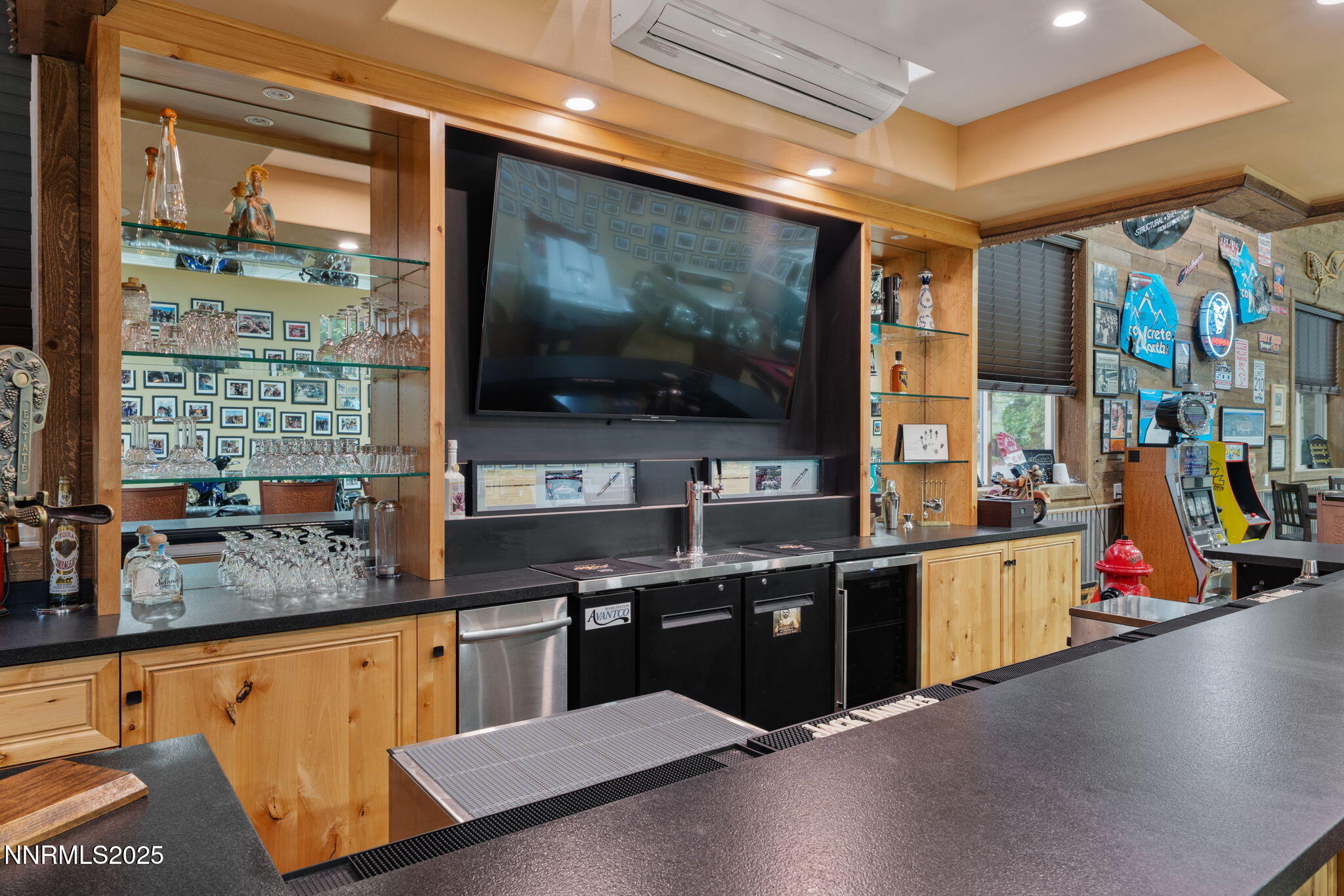 95 Ox-Yoke Lane Reno, NV 89521 - Photo 126 of 160 a kitchen with stainless steel appliances kitchen island granite countertop a sink and wooden cabinets