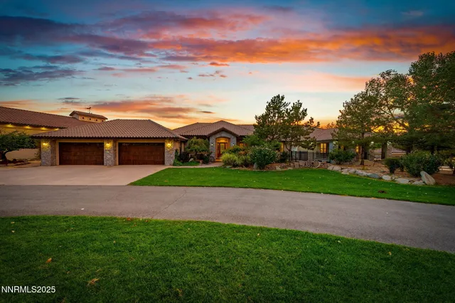 a bathroom with a bathtub and a flat screen tv