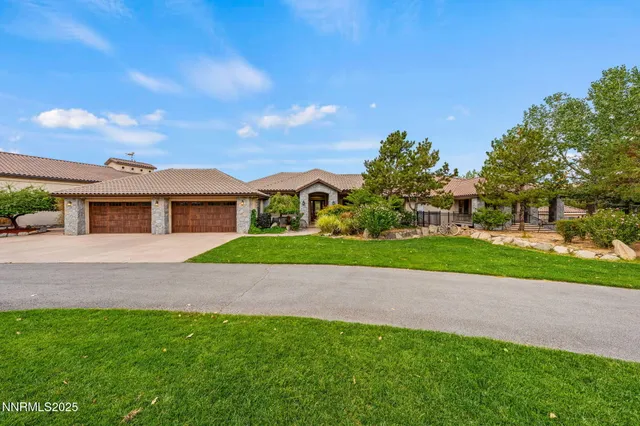 a bathroom with a toilet a sink and a mirror