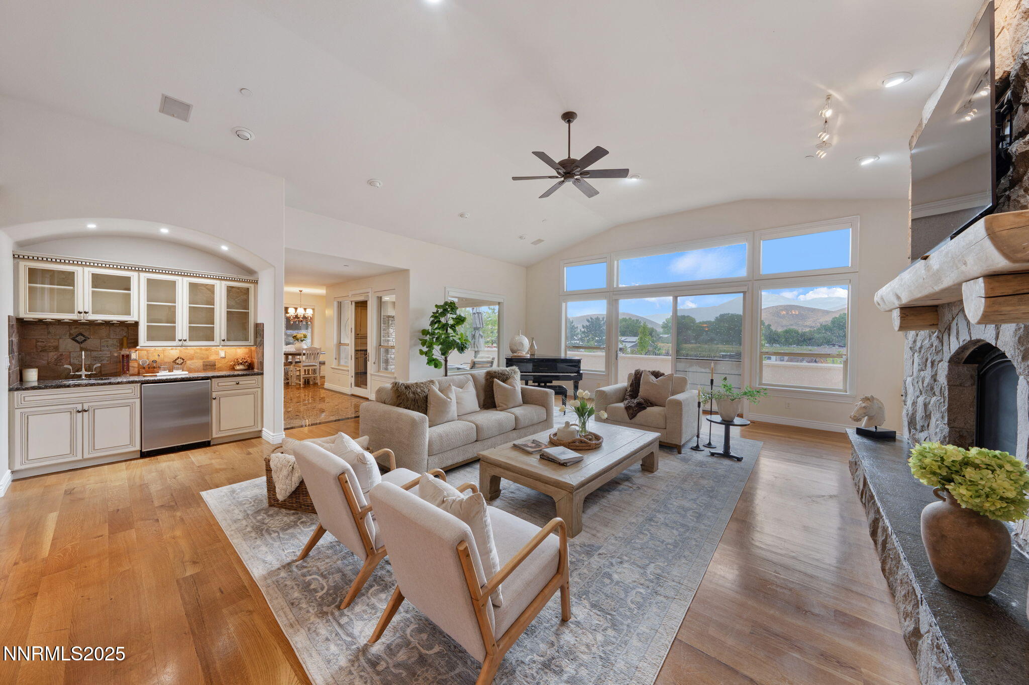 95 Ox-Yoke Lane Reno, NV 89521 - Photo 24 of 160 a living room with fireplace furniture and a large window