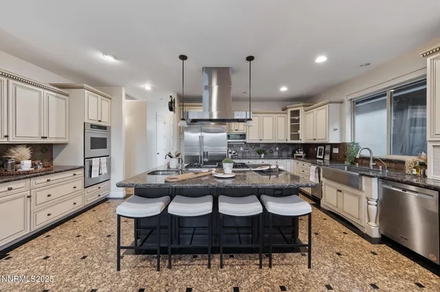 a spacious bedroom with a large bed and a window