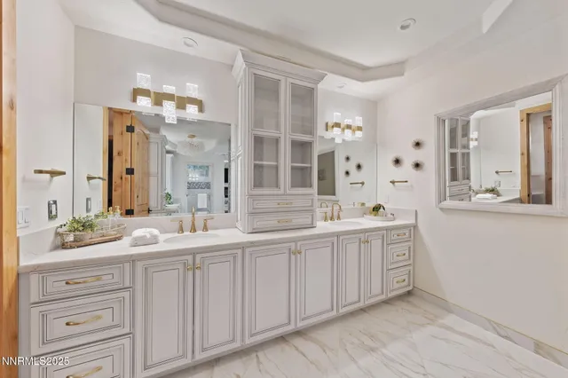 a view of a porch with furniture and a garage