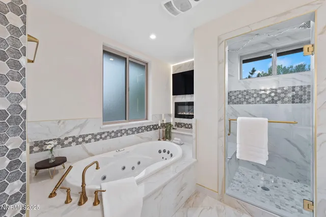 a kitchen with stainless steel appliances granite countertop a stove and a refrigerator