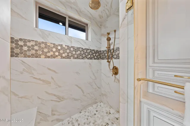 a living room with lots of furniture and a chandelier