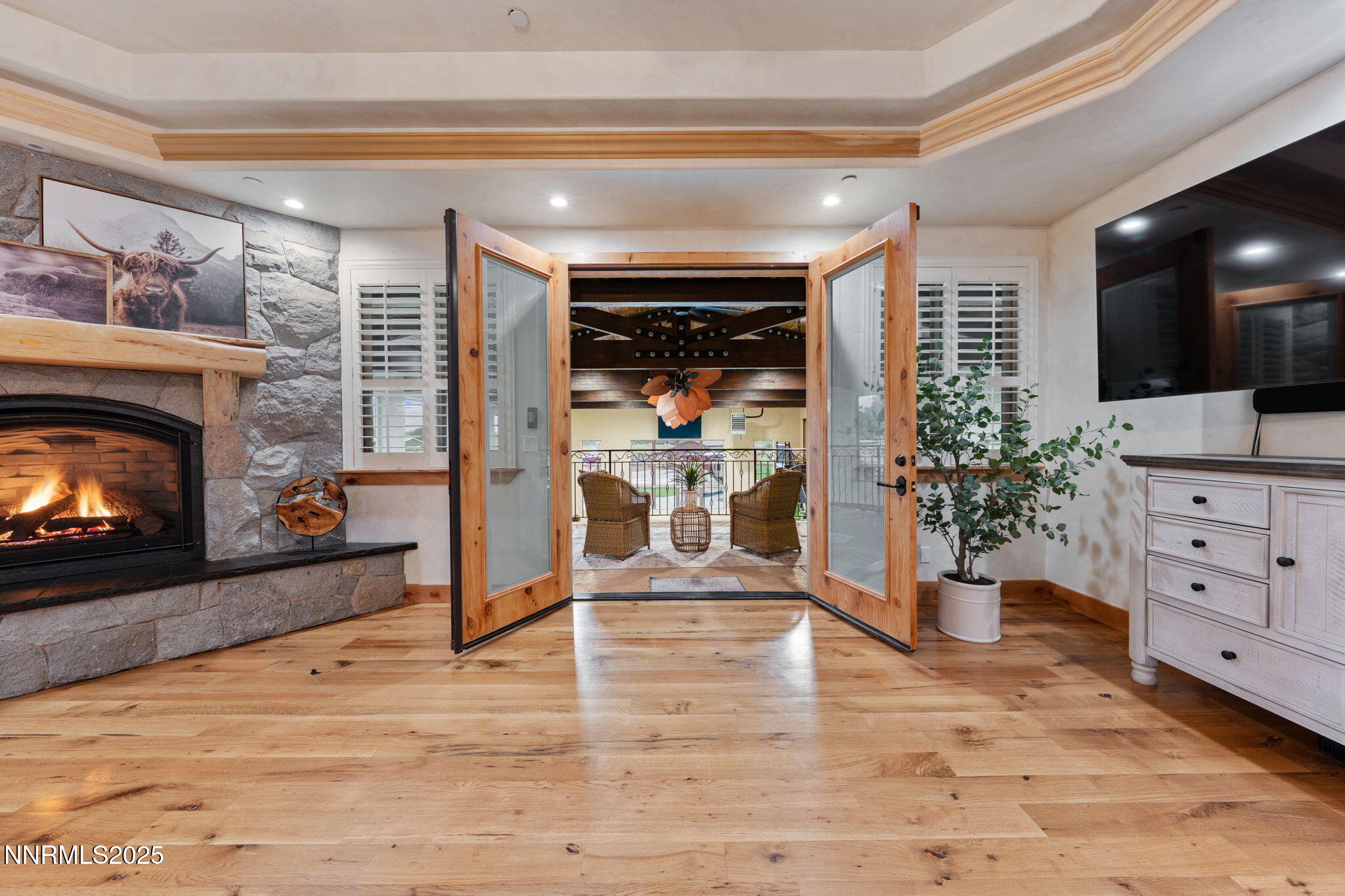 95 Ox-Yoke Lane Reno, NV 89521 - Photo 47 of 160 a view of a livingroom with a fireplace and window