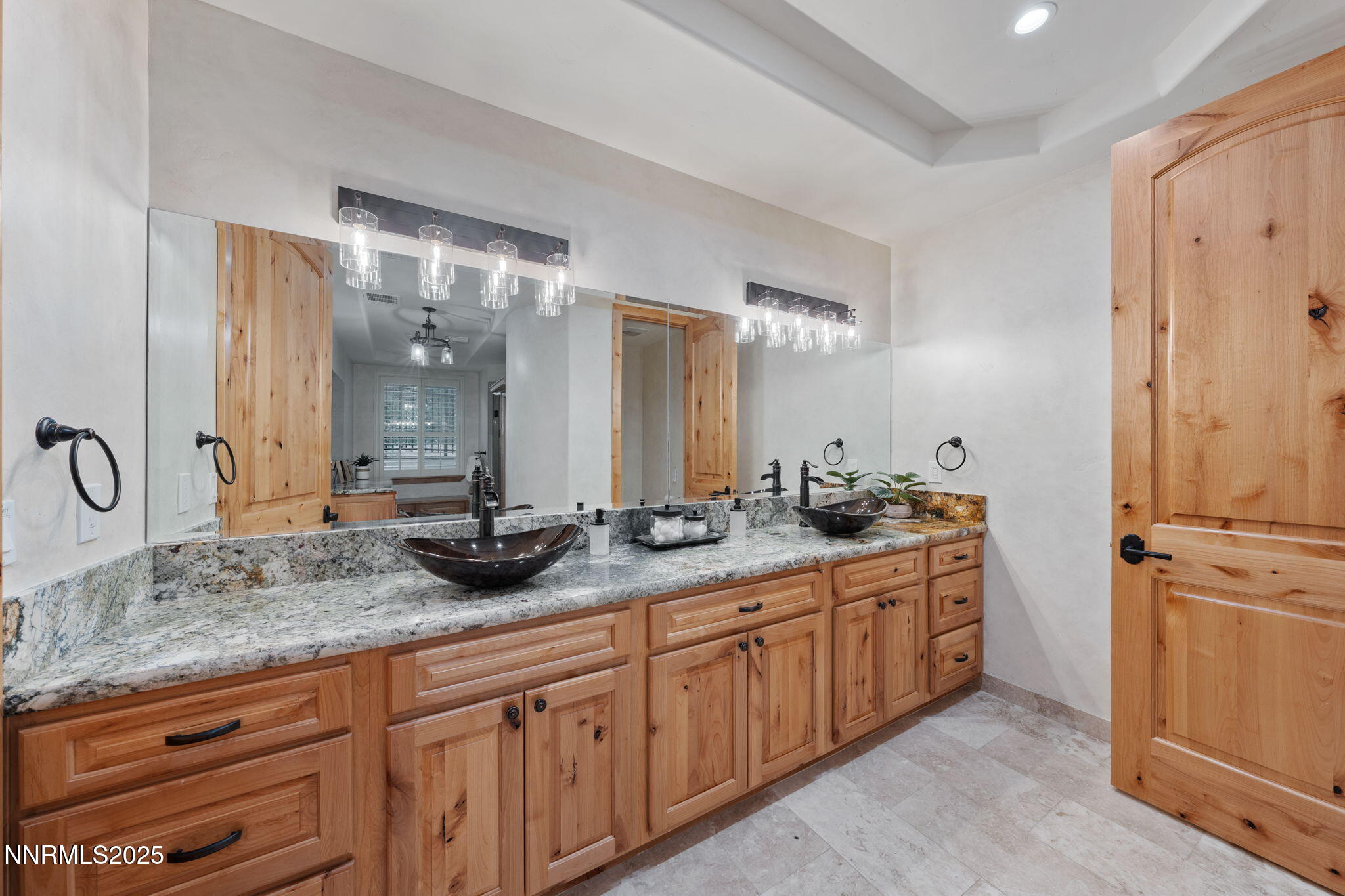 95 Ox-Yoke Lane Reno, NV 89521 - Photo 64 of 160 a bathroom with double sink and a mirror