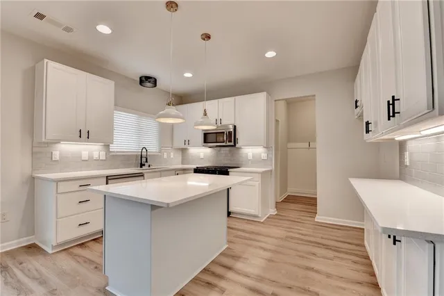 a small space with a window and a bathroom