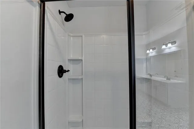 a view of balcony with wooden floor and fence