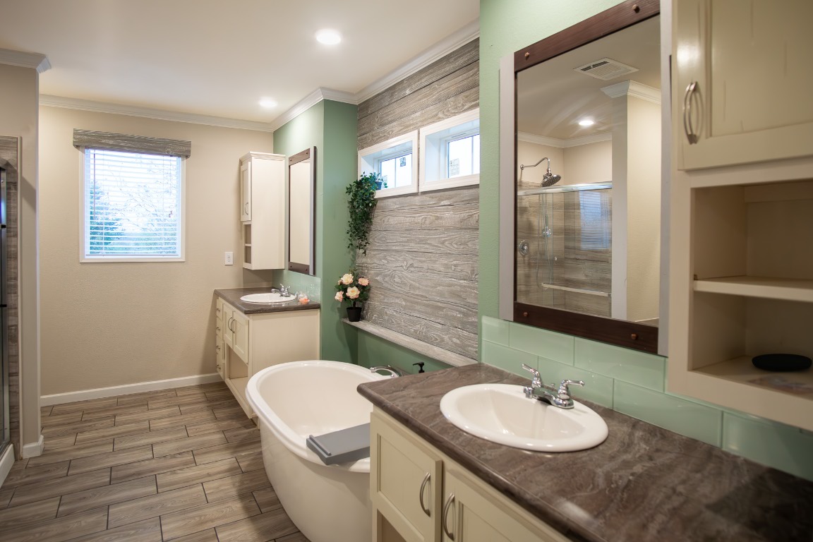 3882 Dry Creek Road Lockhart, TX 78644 - Photo 10 of 18 a bathroom with a sink and a mirror