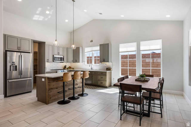 4222 Hampshire Road Hurricane, UT 84737 - Photo 5 of 12 Vaulted ceilings define this open-concept kitchen and dining area