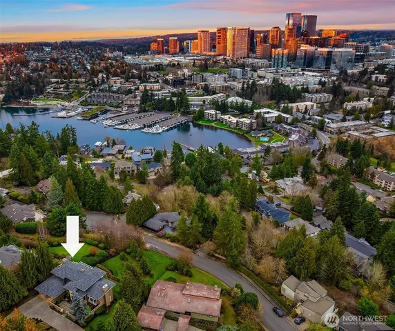 a view of an entryway with wooden floor and windows
