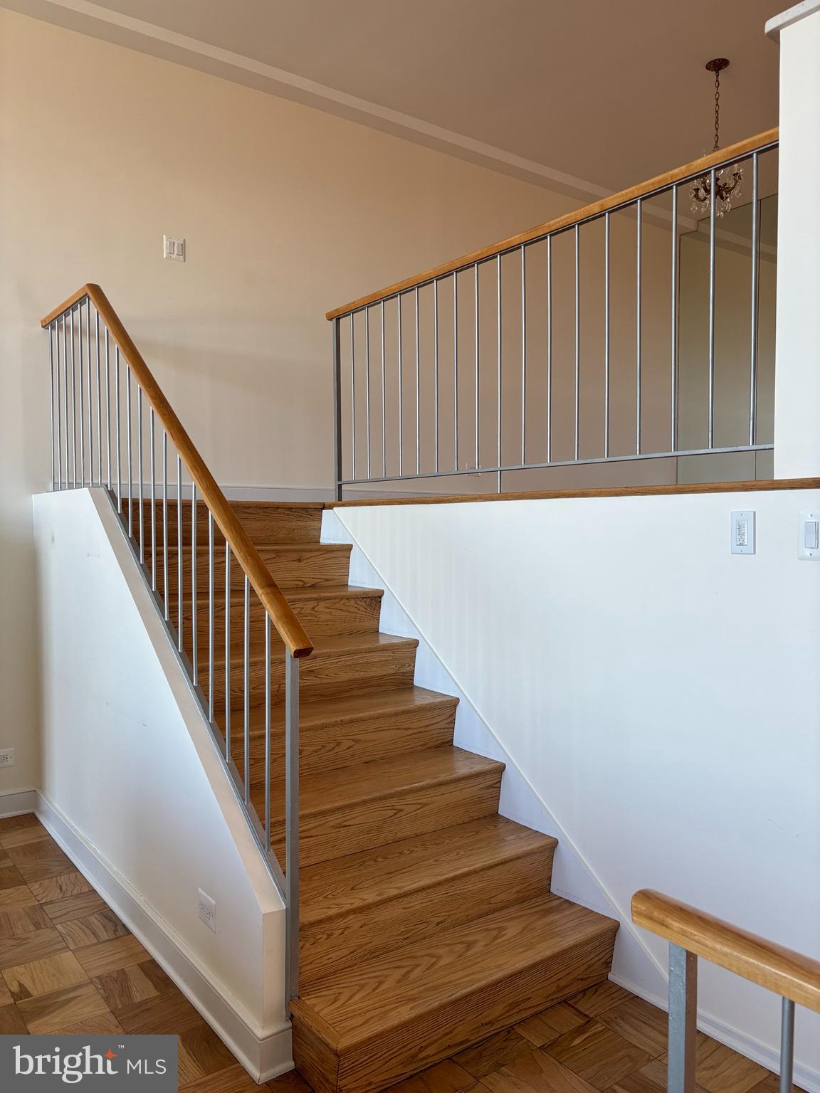 1200 North Nash Street, Unit 830 Arlington, VA 22209 - Photo 14 of 32 Stairs Up to the 2nd Level