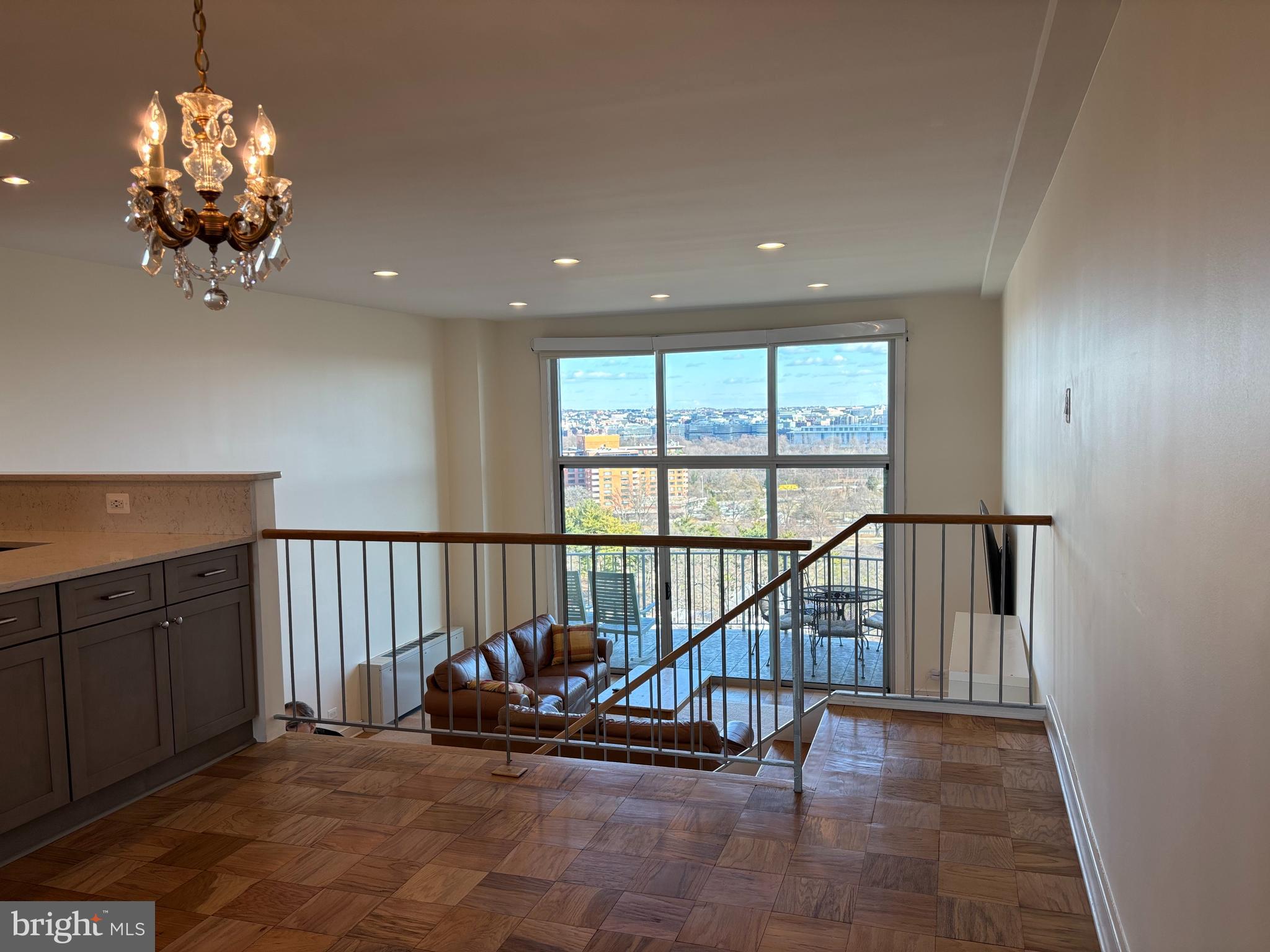 1200 North Nash Street, Unit 830 Arlington, VA 22209 - Photo 15 of 32 Second Level with Dining Area & Kitchen