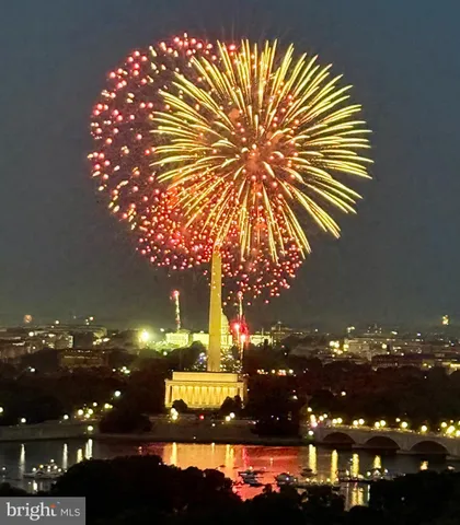 a view of a house with a tree