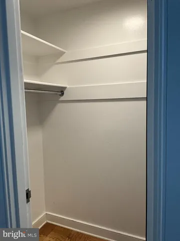 a view of small space with racks on the wall