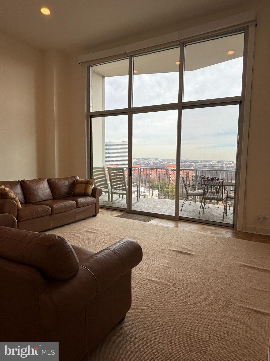 1200 North Nash Street, Unit 830 Arlington, VA 22209 - Photo 8 of 32 Floor to Ceiling Windows for Lots of Natural Light