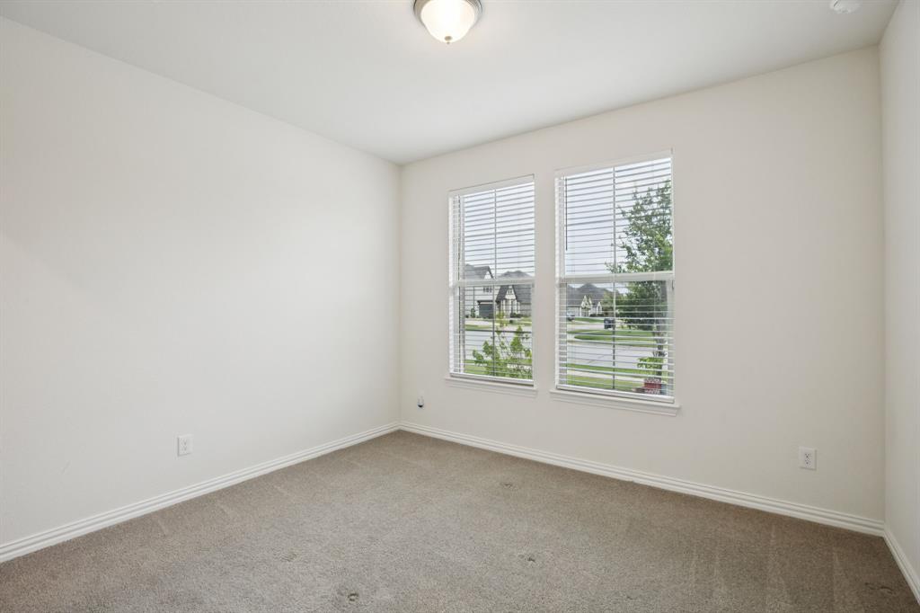 3913 Forged Way McKinney, TX 75071 - Photo 21 of 40 Bedroom 1 - 1st Floor