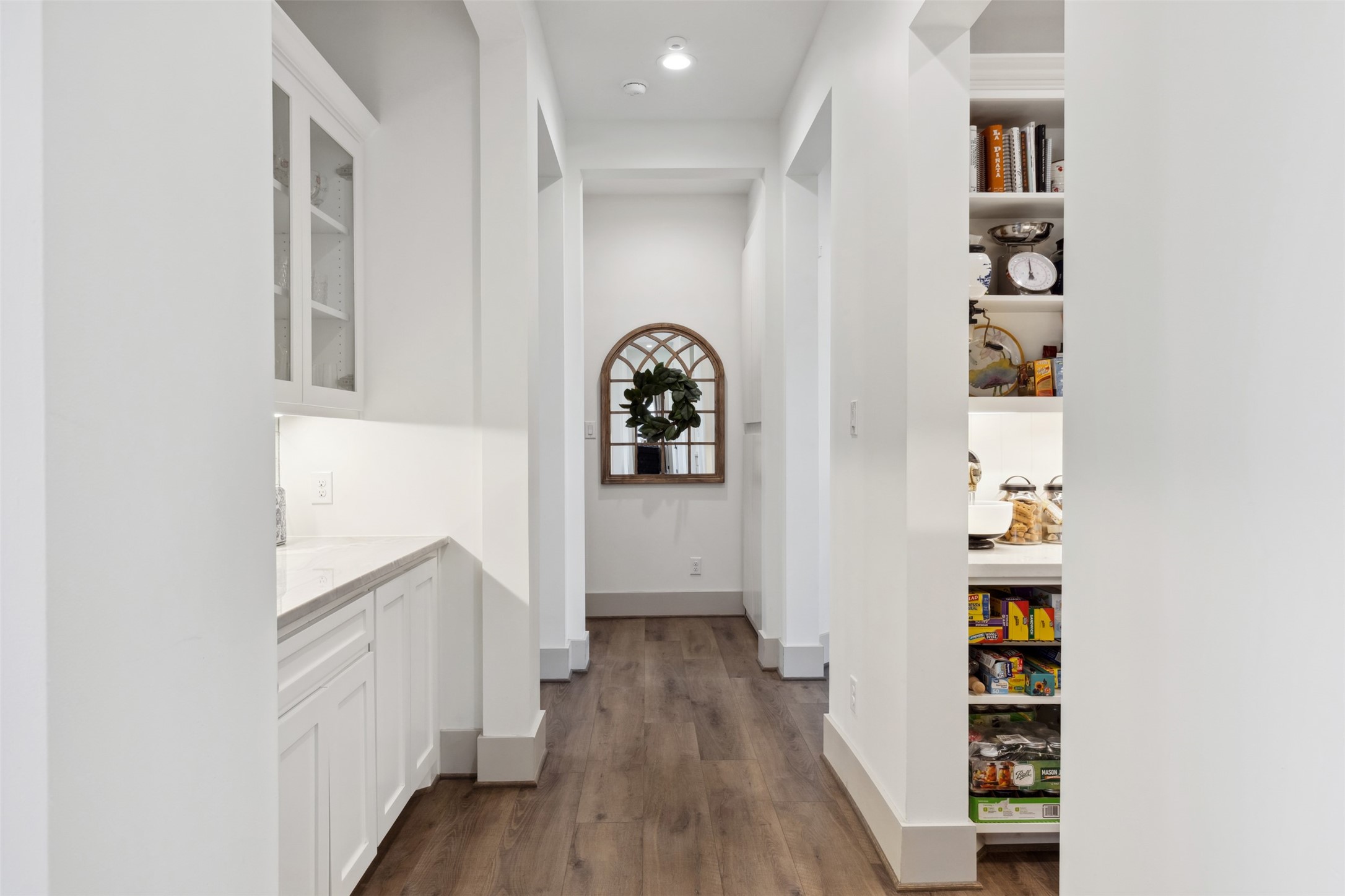 501 Wimberly Circle Hempstead, TX 77445 - Photo 17 of 45 a view of a hallway with wooden floor and entryway