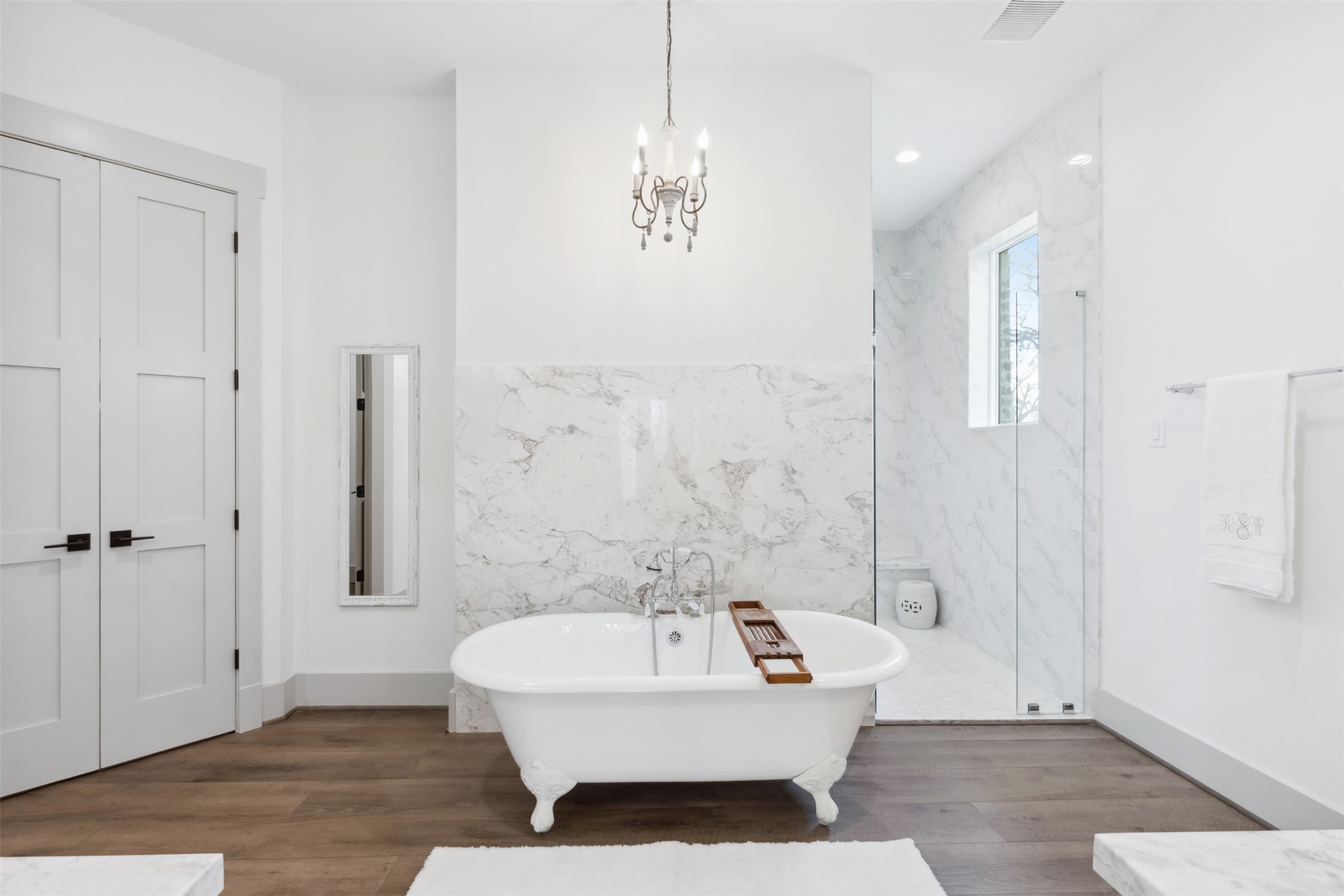 501 Wimberly Circle Hempstead, TX 77445 - Photo 22 of 45 a bathroom with a sink a mirror and a shower
