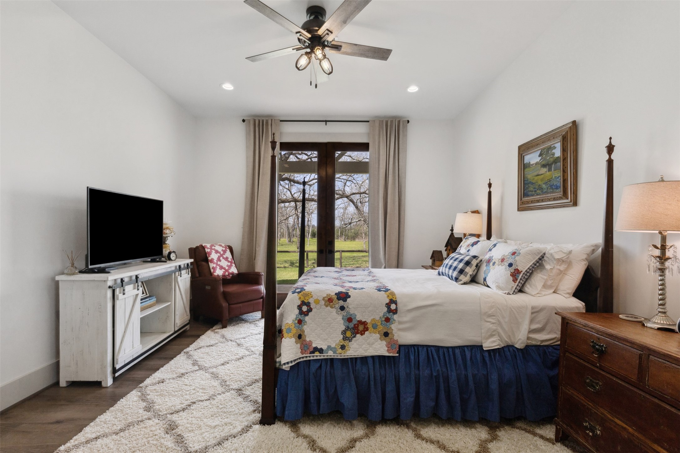 501 Wimberly Circle Hempstead, TX 77445 - Photo 30 of 45 a bedroom with a bed and a flat screen tv