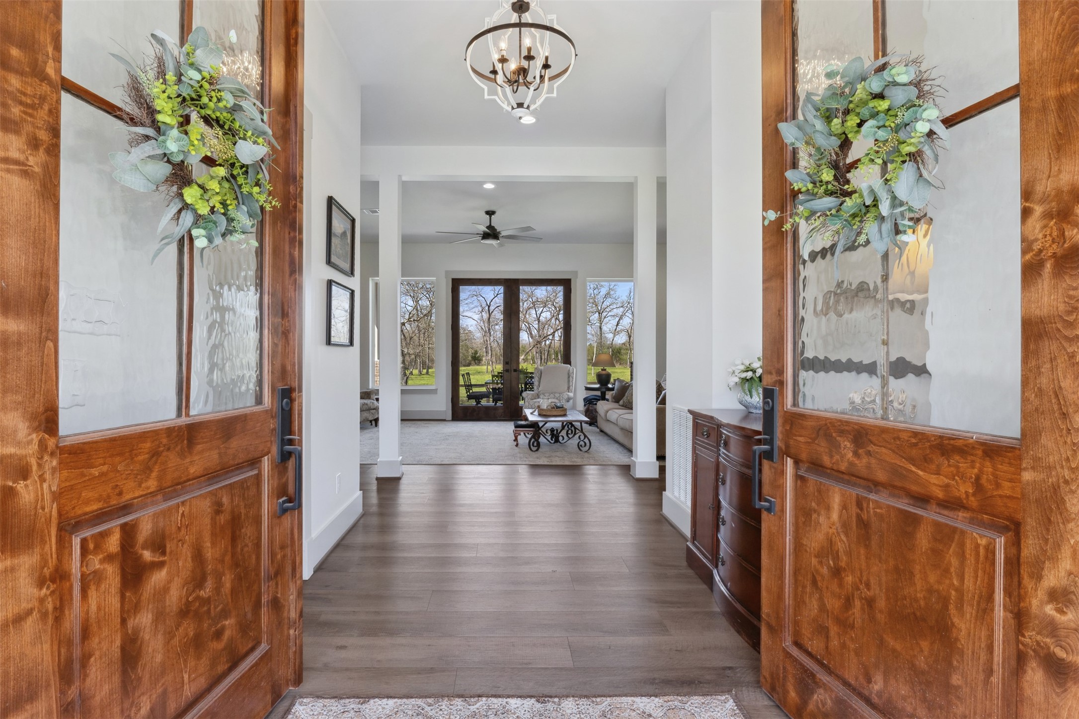 501 Wimberly Circle Hempstead, TX 77445 - Photo 5 of 45 wooden floor in a gallery with a potted plant