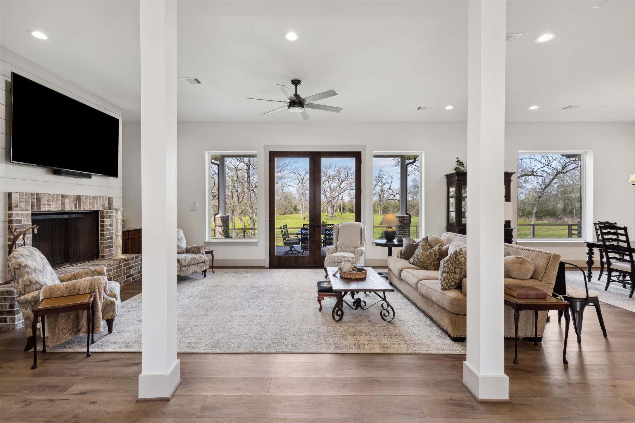 501 Wimberly Circle Hempstead, TX 77445 - Photo 8 of 45 a living room with fireplace furniture and a flat screen tv