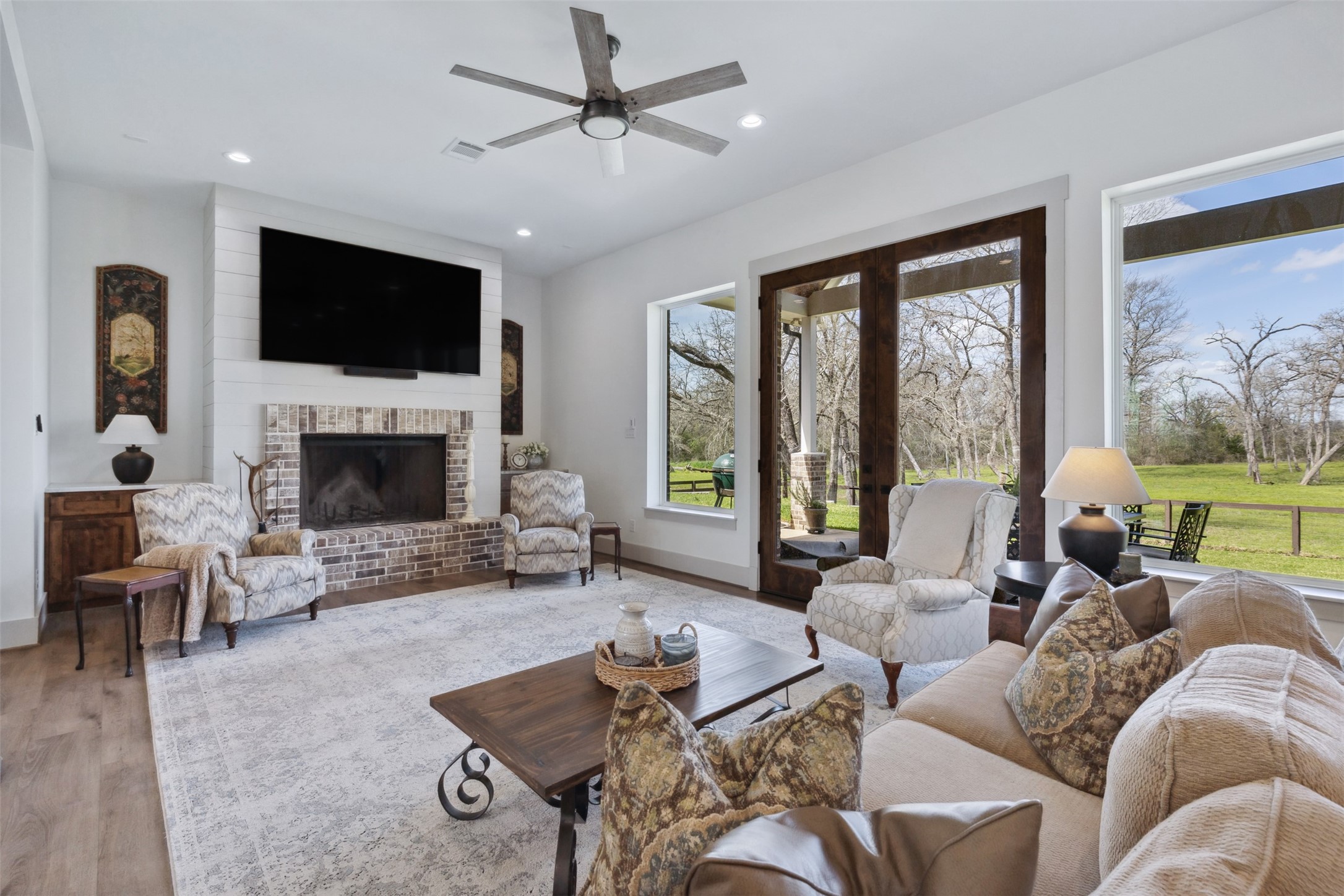 501 Wimberly Circle Hempstead, TX 77445 - Photo 10 of 45 a living room with furniture fireplace and a flat screen tv