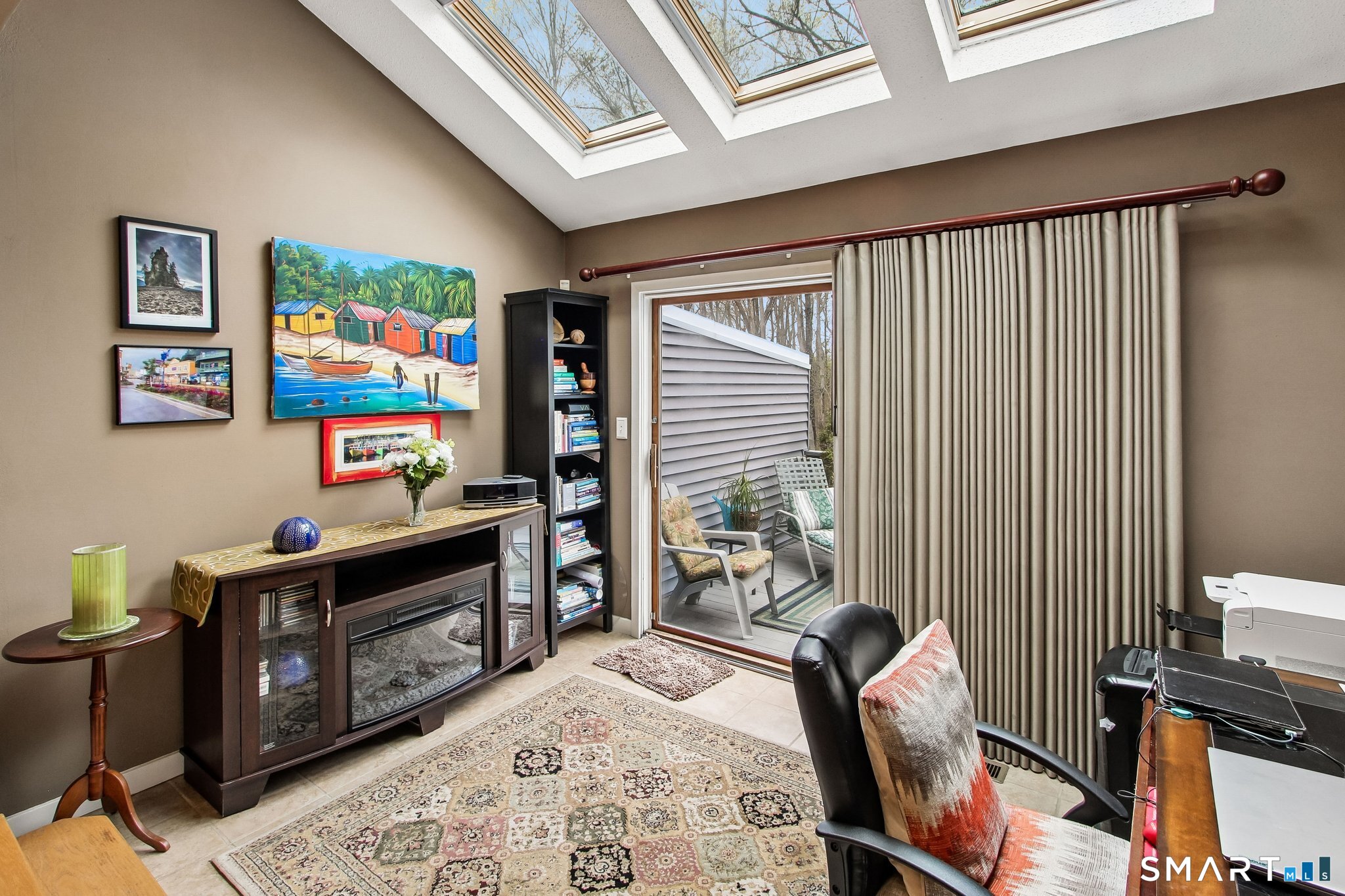 60 Clintonville Road, Unit 103 North Branford, CT 06472 - Photo 16 of 40 Perfect spot for relaxing or a home/office with slider with access to a large rear deck overlooking the woods.