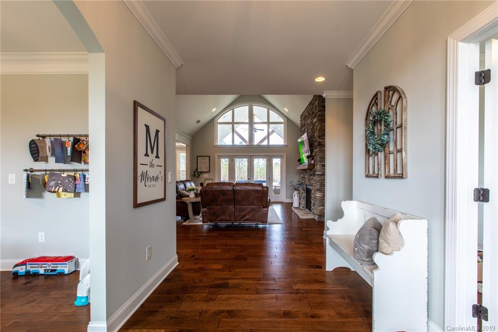 283 Currence Road Clover, SC 29710 - Photo 11 of 35 a living room with furniture and a wooden floor