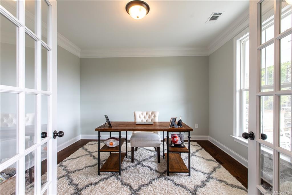 283 Currence Road Clover, SC 29710 - Photo 13 of 35 a view of a workspace with furniture and a window