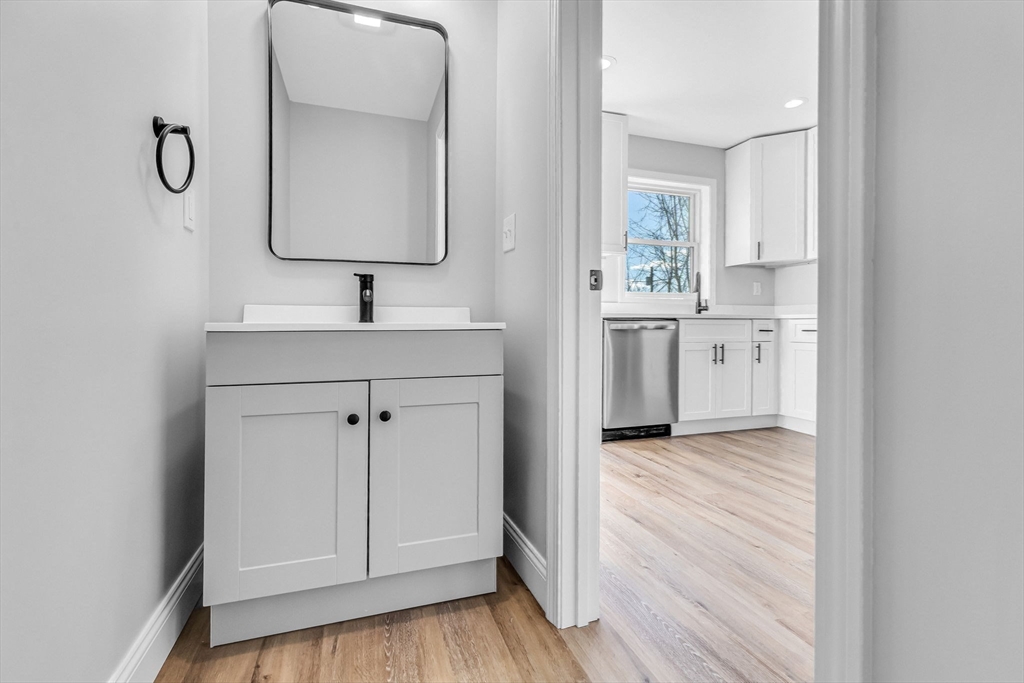 213 Pine Street, Unit 213 Springfield, MA 01105 - Photo 17 of 25 a bathroom with a sink and a mirror