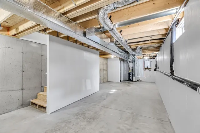 a view of a hallway with stairs
