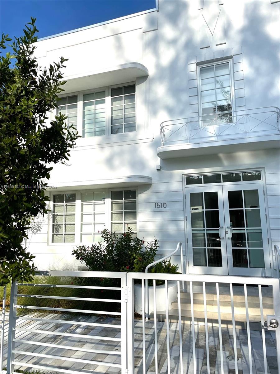1610 Euclid Avenue, Unit A110 Miami Beach, FL 33139 - Photo 2 of 19 a front view of a house with a window