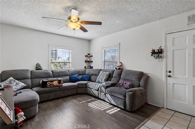 a hallway with a baby crib and a table in it