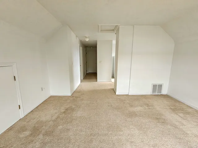 an empty room with a natural light