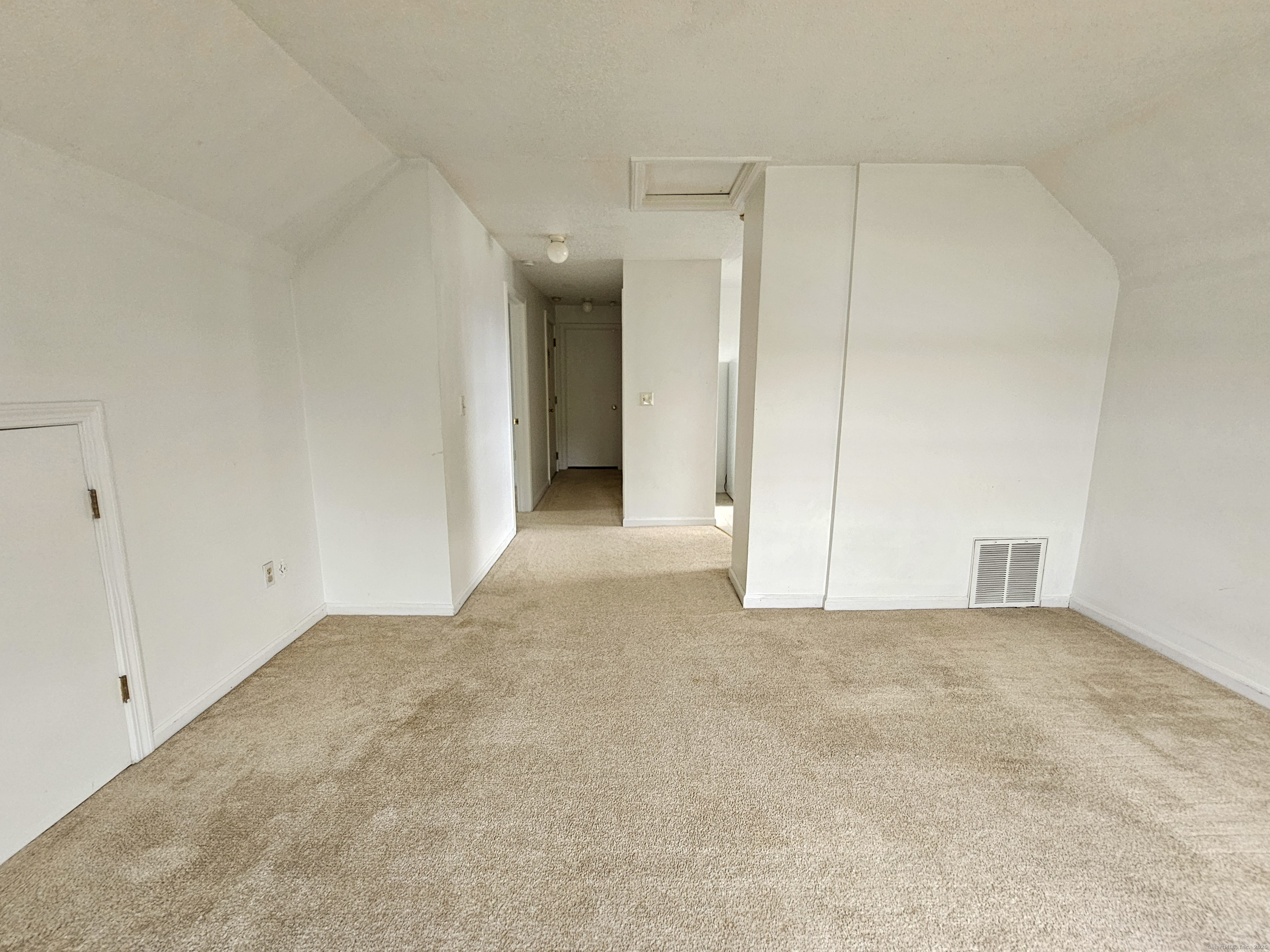 54 Washington Street, Unit 3 Wallingford, CT 06492 - Photo 6 of 9 an empty room with a natural light