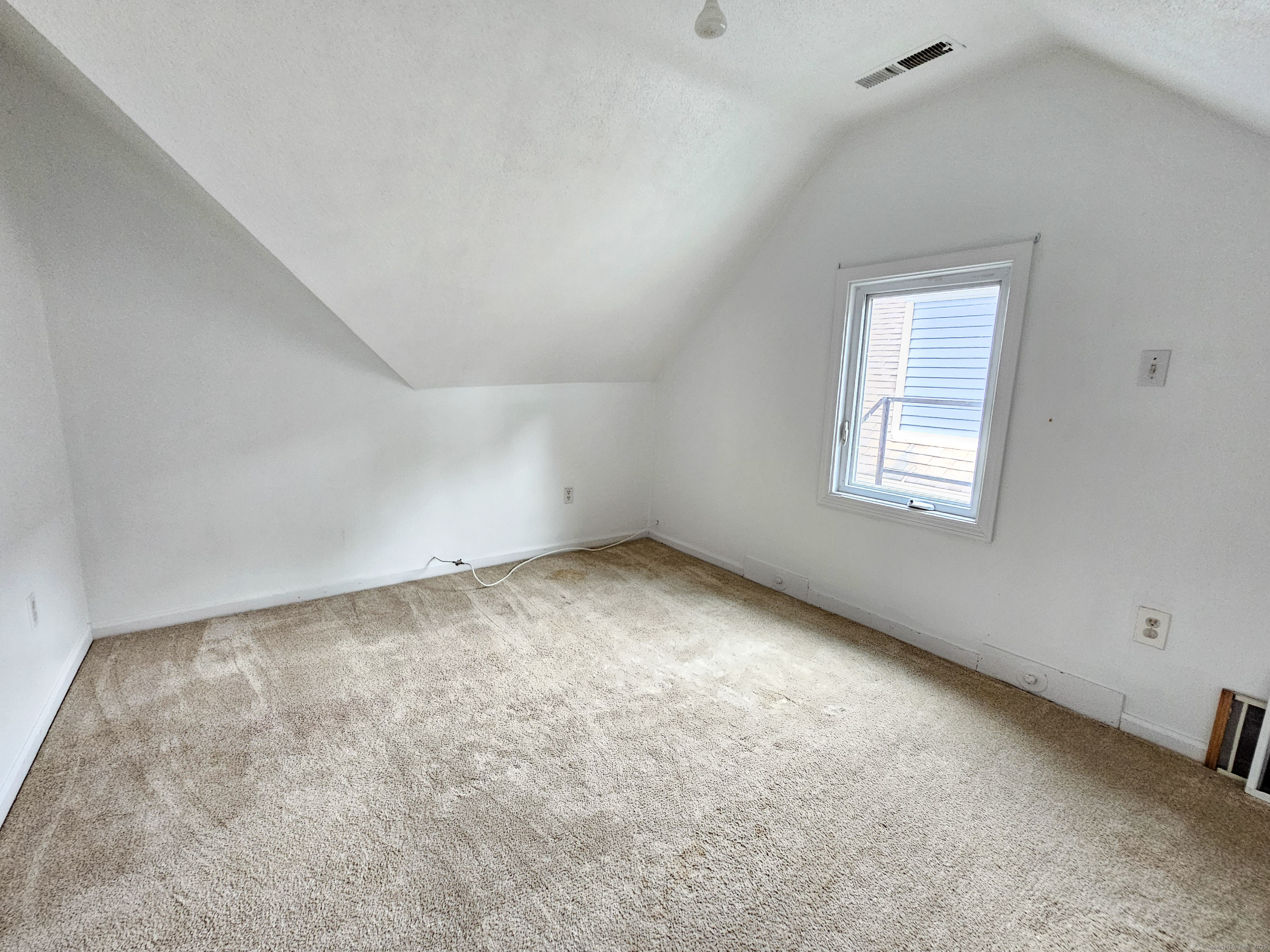 54 Washington Street, Unit 3 Wallingford, CT 06492 - Photo 8 of 9 an empty room with a window